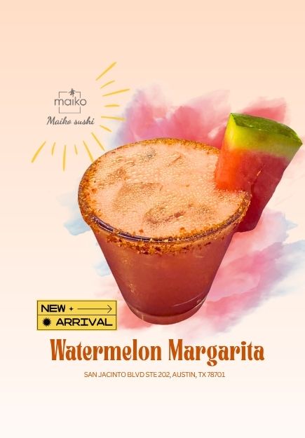 Watermelon Margarita with a chili rim and a fresh melon wedge.